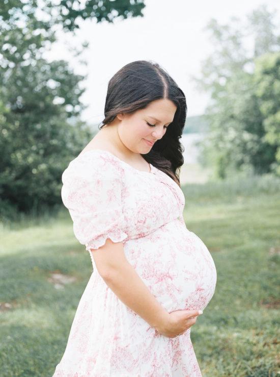 Healthy expecting mother in Ann Arbor, Michigan during photo session with Laurel Smith Photography after taking a class for prenatal yoga in Ann Arbor.