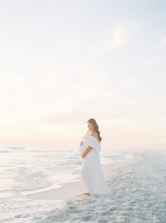 Pregnant mother on beach after a relaxing weekend at one of the top 5 spas in Napa