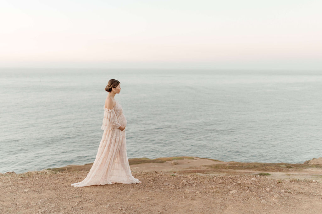 Family maternity pictures in San Francisco highlighting a tender solo portrait after family and partner images are complete.