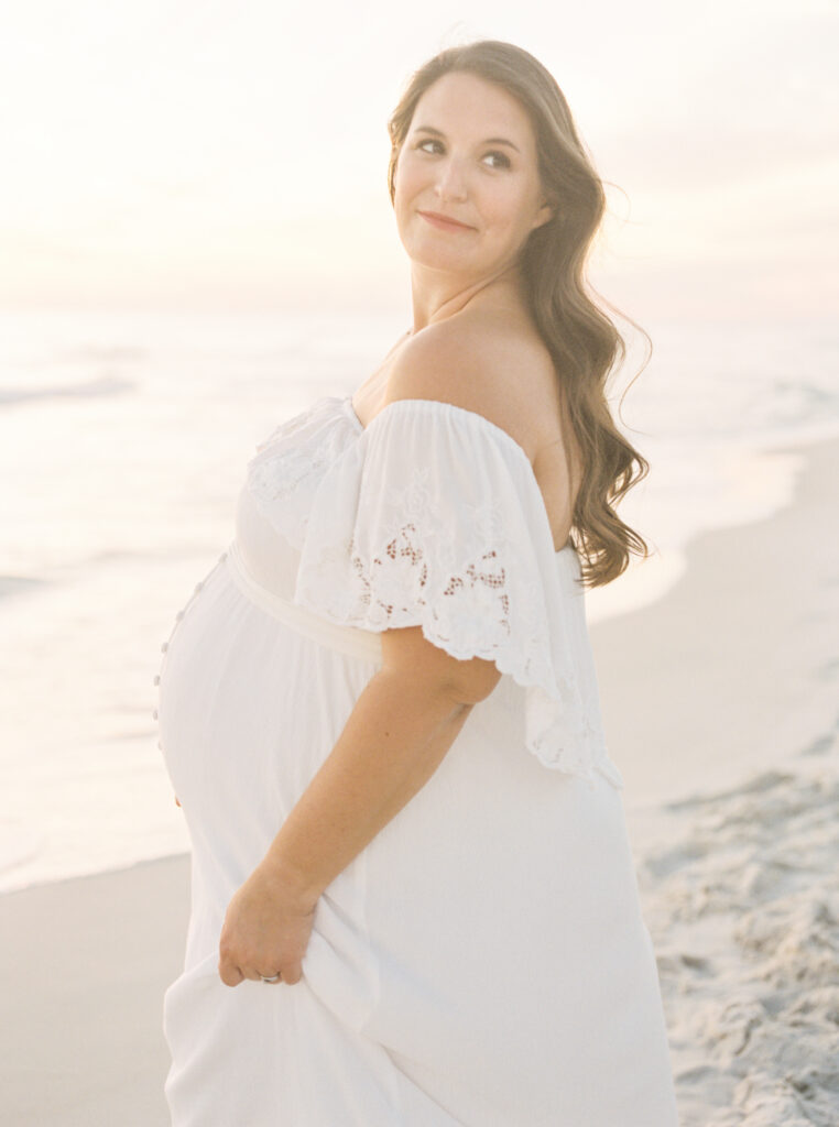 San Francisco maternity photos captured at golden hour along the coast. 