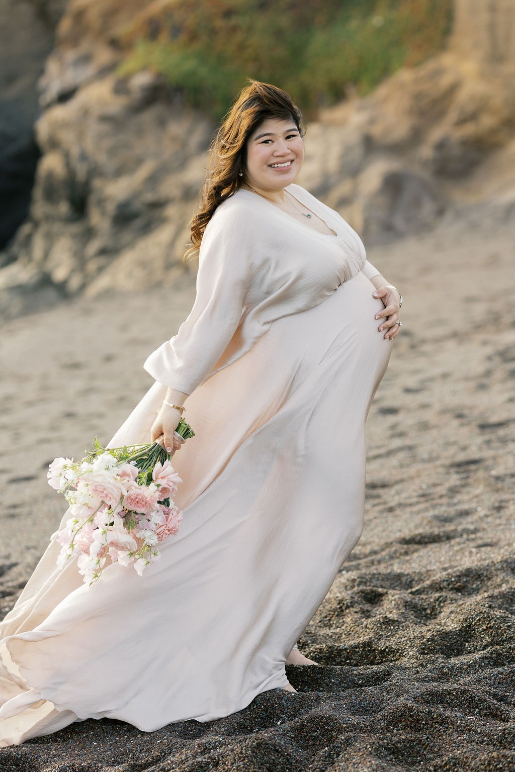 portrait of a pregnant woman during her maternity photoshoot at one of the best san francisco photo shoot locations